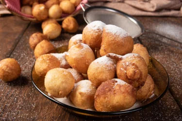 brazilian-sweet-called-bolinho-de-chuva-covered-with-sugar-rustic-wood-1-1-scaled